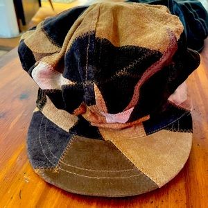 Cute  multi color leather hat. Real suede leather.   Nice hat.  Lightly used.